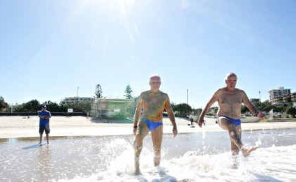 Phil Weight watches fellow Stunned Mullets Barry Thomas and Ron Carr head for a swim at Kings Beach. Phil Weight watches fellow Stunned Mullets Barry Thomas and Ron Carr head for a swim at Kings Beach.